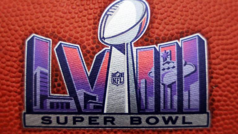 LAS VEGAS, NEVADA - FEBRUARY 06: A general view of official logo footballs displayed in the NFL Super Bowl Experience ahead of Super Bowl LVIII on February 06, 2024 in Las Vegas, Nevada. Jamie Squire/Getty Images/AFP (Photo by JAMIE SQUIRE / GETTY IMAGES NORTH AMERICA / Getty Images via AFP)