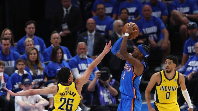 OKLAHOMA CITY, OKLAHOMA - JUNE 08: Shai Gilgeous-Alexander #2 of the Oklahoma City Thunder attempts a jump shot against Ben Sheppard #26 of the Indiana Pacers during the fourth quarter in Game Two of the 2025 NBA Finals at Paycom Center on June 08, 2025 in Oklahoma City, Oklahoma.