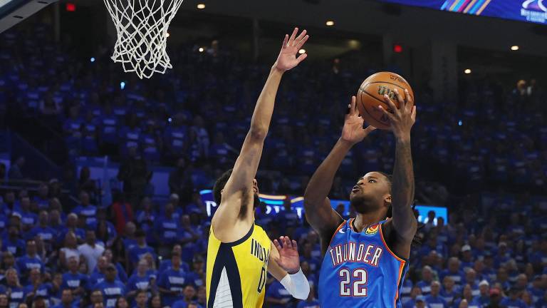 OKLAHOMA CITY, OKLAHOMA - JUNE 08: Cason Wallace #22 of the Oklahoma City Thunder attempts a layup against Tyrese Haliburton #0 of the Indiana Pacers during the first quarter in Game Two of the 2025 NBA Finals at Paycom Center on June 08, 2025 in Oklahoma City, Oklahoma.