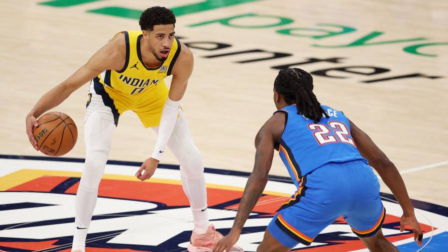$!OKLAHOMA CITY, OKLAHOMA - JUNE 08: Tyrese Haliburton #0 of the Indiana Pacers is defended by Cason Wallace #22 of the Oklahoma City Thunder during the first quarter in Game Two of the 2025 NBA Finals at Paycom Center on June 08, 2025 in Oklahoma City, Oklahoma.