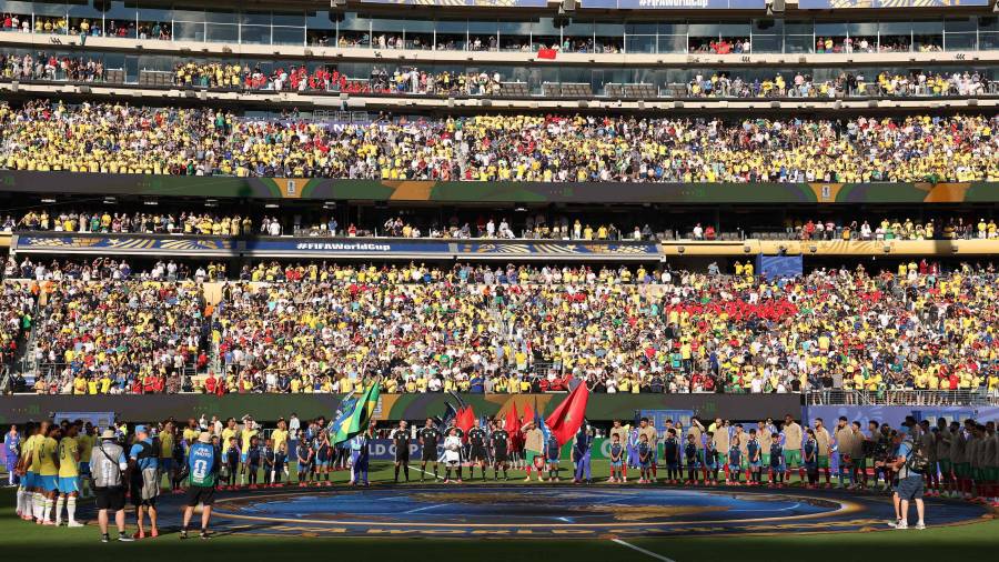 $![EAST RUTHERFORD, NEW JERSEY - JUNE 13: A general view as players line up before the FIFA World Cup]